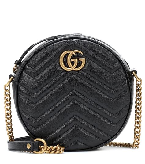 black round gucci bag|Gucci suede crossbody bag.